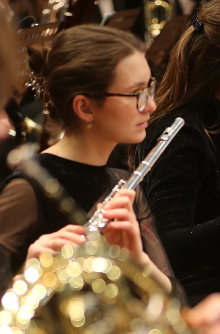 Agatha Gurko playing flute in an ensemble